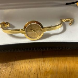 Movado Ladies Gold Bangle Watch
